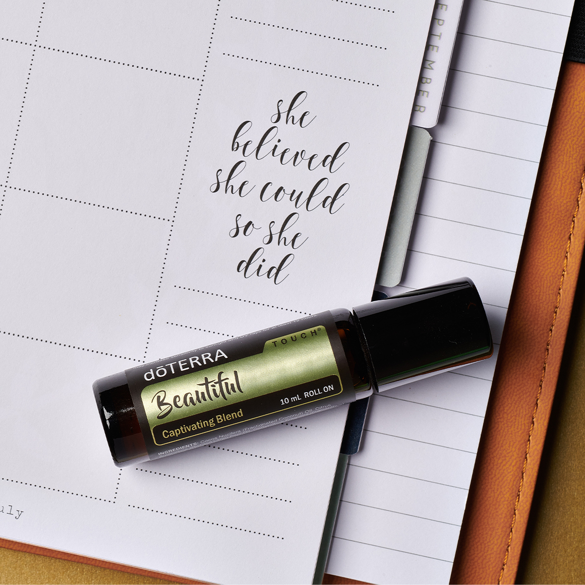 A bottle of dōTERRA Beautiful blend with a quote" she believed she could so she did".