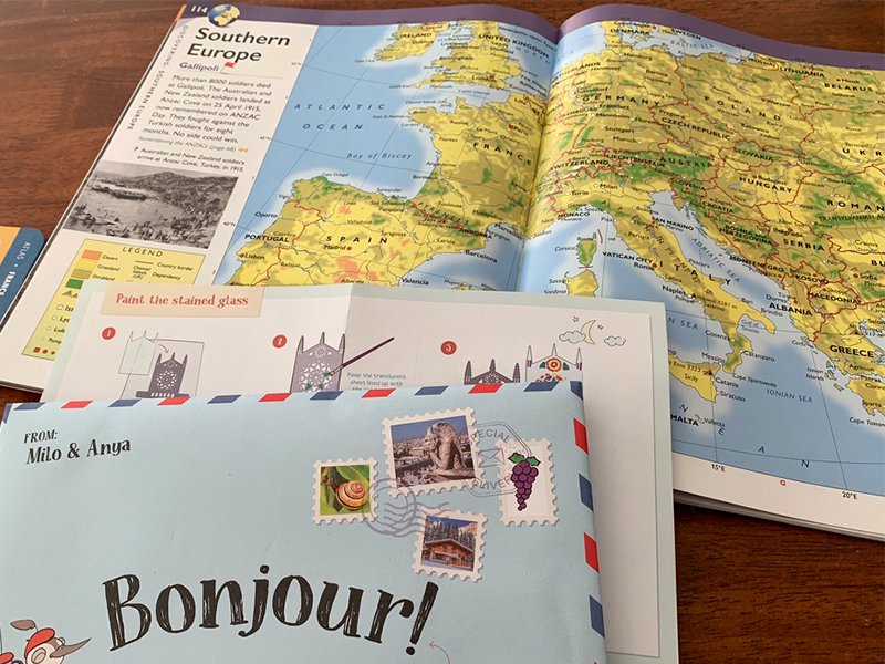 A detailed textbook spread showing a colorful elevation map of Europe, photos of natural landmarks like the Matterhorn and Mt. Etna, and facts about Europe's geography—an example of visual, text-rich content ideal for neurodivergent homeschool resources that support spatial and sensory learning. The page helps